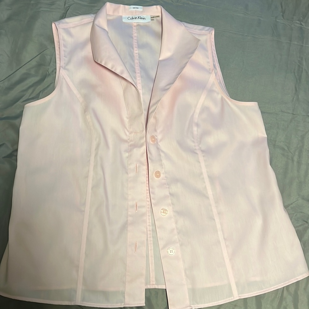 Calvin Klein non-iron sleeveless button down shirt-only worn once. Size 12. Pink